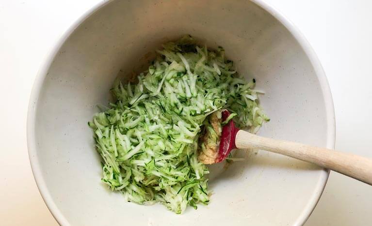 shredded zucchini in bowl