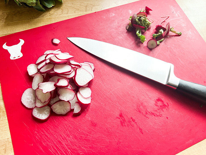 cutting board with radishes
